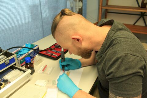 Dr. L. Kučera sampling the amber finds in Esslingen.